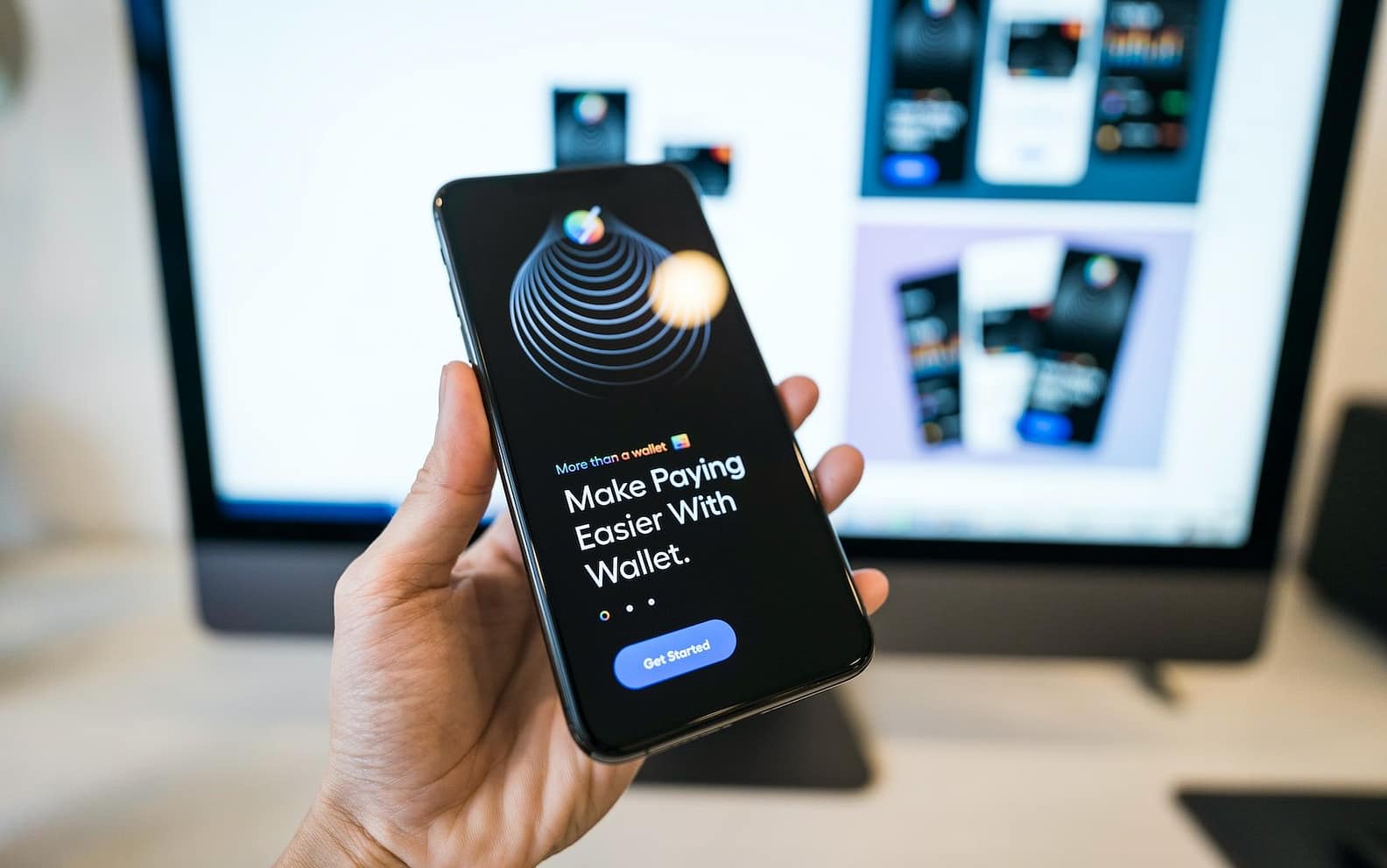 person holding black iphone 4